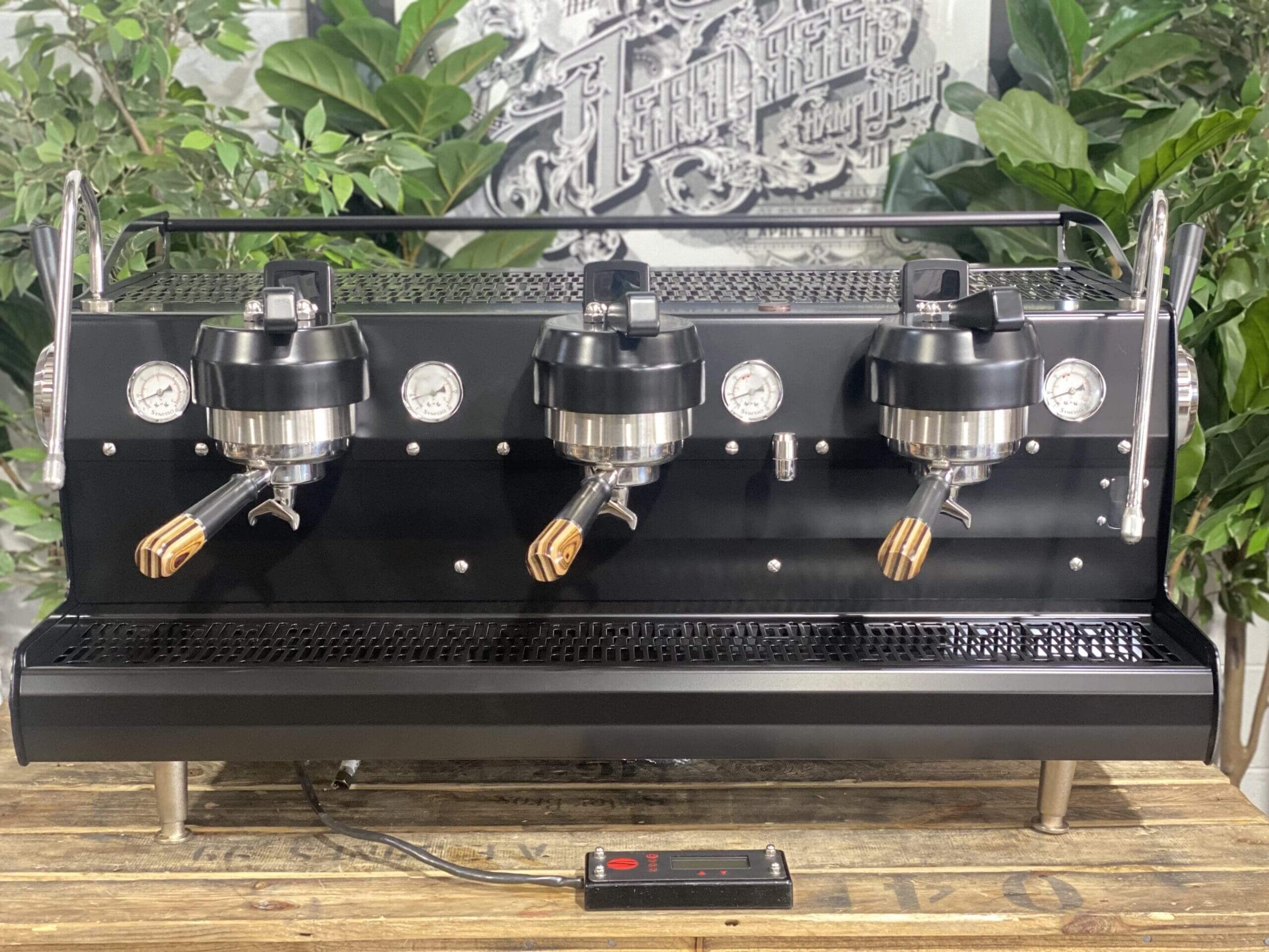 Synesso Sabre Black w. Black & Pesado Handles - 3 Group Commercial Espresso Machine - Brown